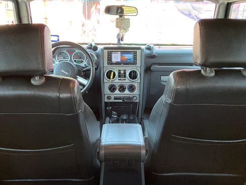 Used 2010 Jeep Wrangler Unlimited Sahara w/ Dual Top Group AWD/4WD image 11