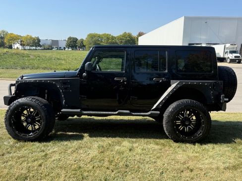 Used 2016 Jeep Wrangler Unlimited Sahara image 1