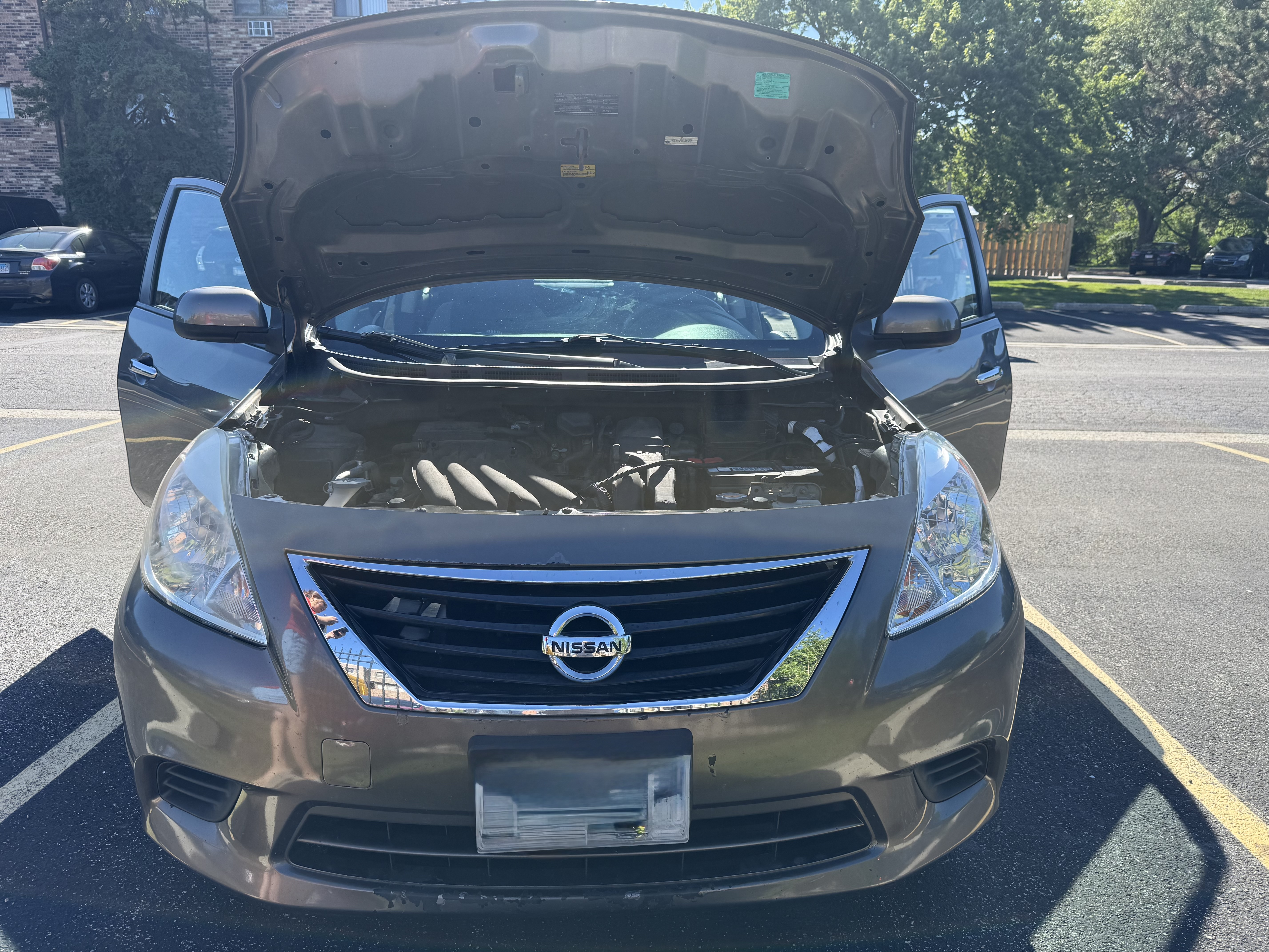Used 2012 Nissan Versa SV FWD image 1
