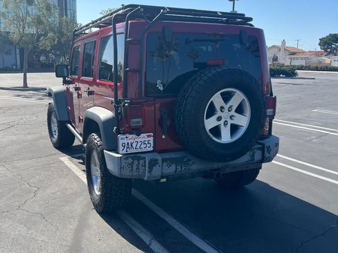 Used 2012 Jeep Wrangler Unlimited Rubicon w/ Dual Top Group AWD/4WD image 4