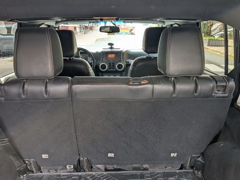 Used 2016 Jeep Wrangler Unlimited Sahara w/ Dual Top Group image 11