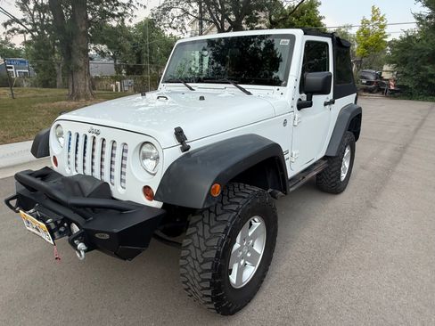 Used 2012 Jeep Wrangler Sport AWD/4WD image 1