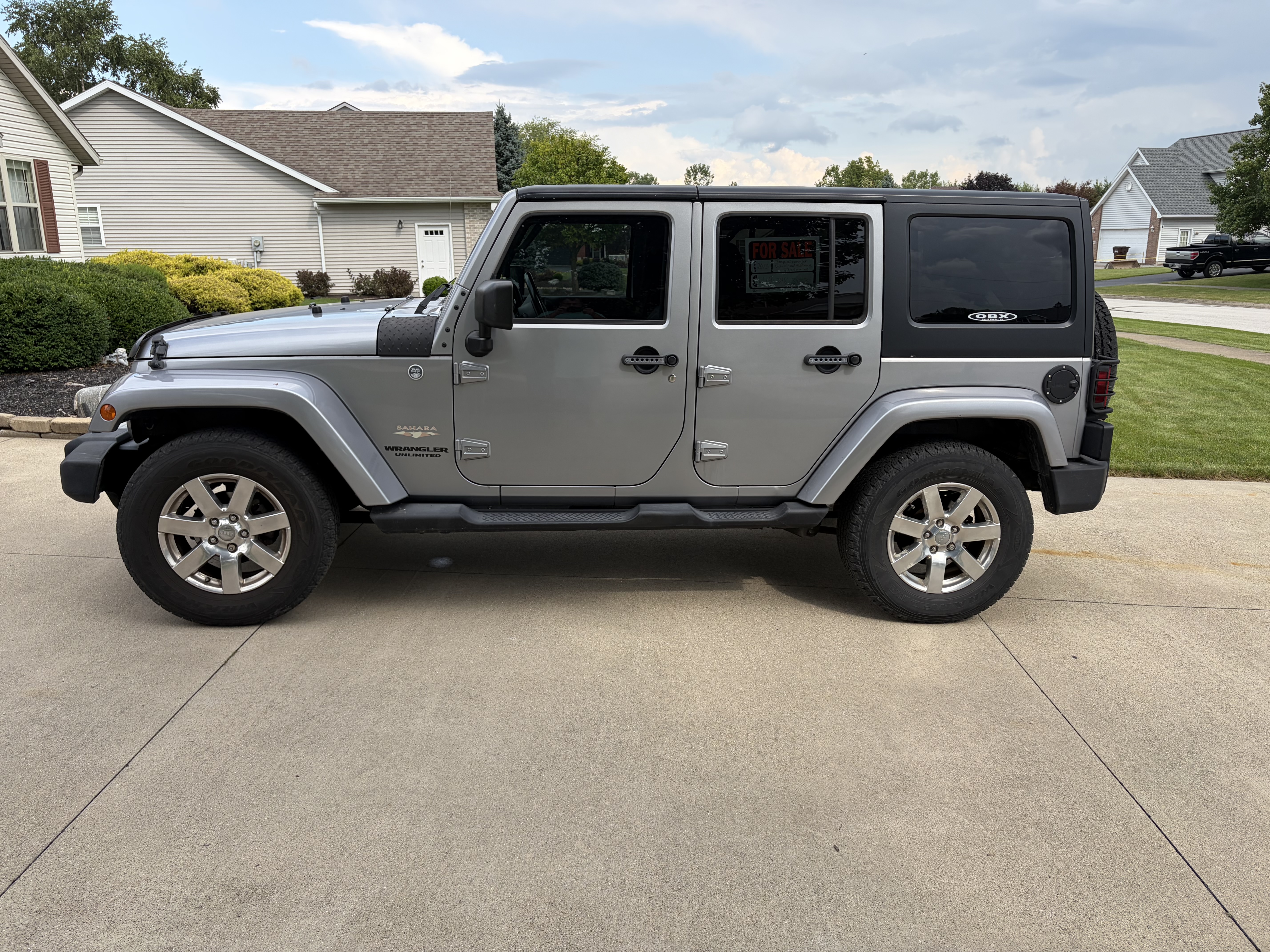 Used 2013 Jeep Wrangler Unlimited Sahara w/ Dual Top Group AWD/4WD image 1