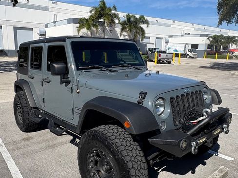 Used 2014 Jeep Wrangler Unlimited Sport image 1