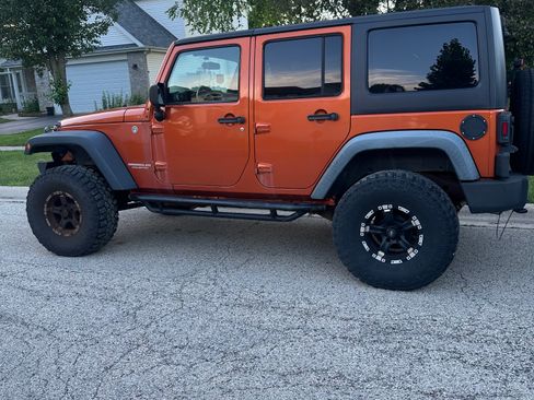 Used 2011 Jeep Wrangler Unlimited Sport AWD/4WD image 2