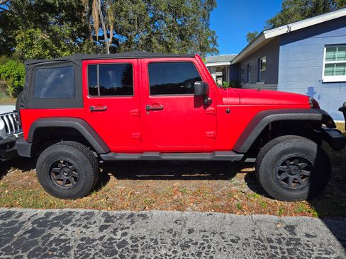 Used 2012 Jeep Wrangler Unlimited Sport image 1