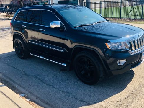 Used 2013 Jeep Grand Cherokee Overland w/ Advance Technology Group AWD/4WD image 1