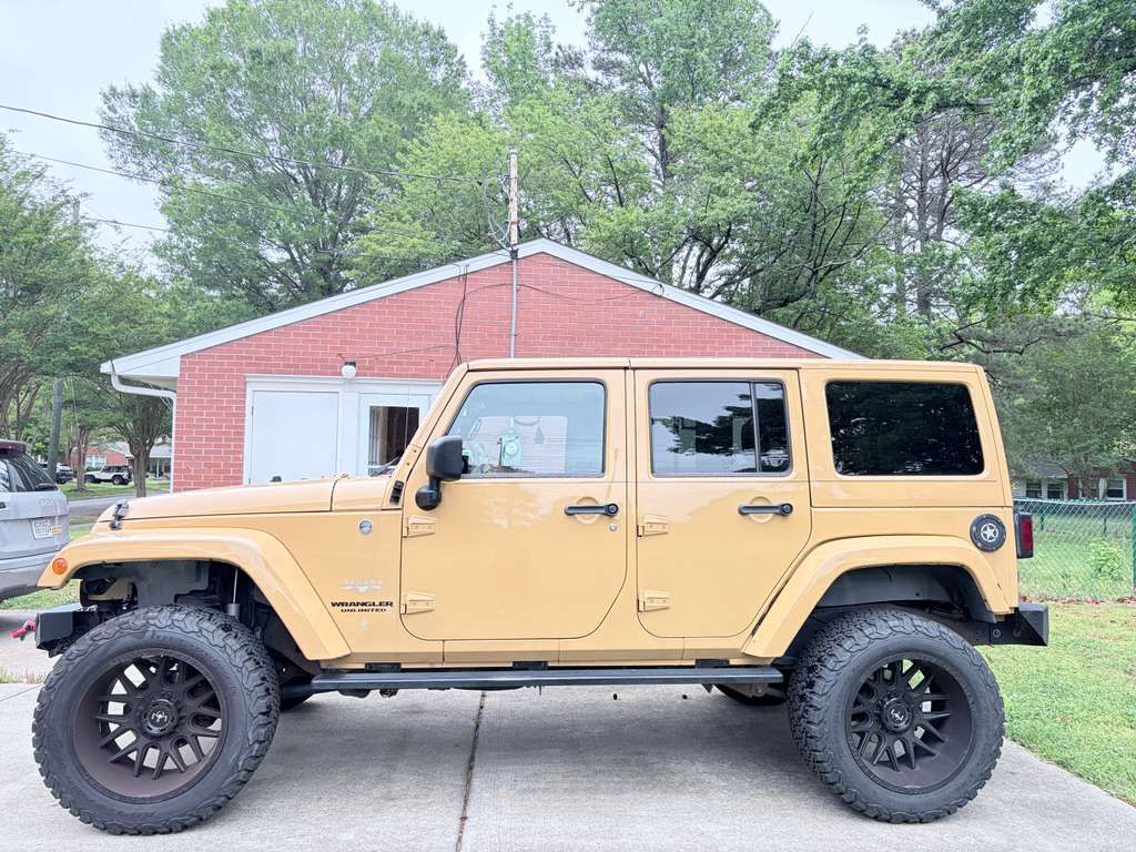Used 2013 Jeep Wrangler Unlimited Sahara w/ Mopar Chrome Edition Group AWD/4WD image 12