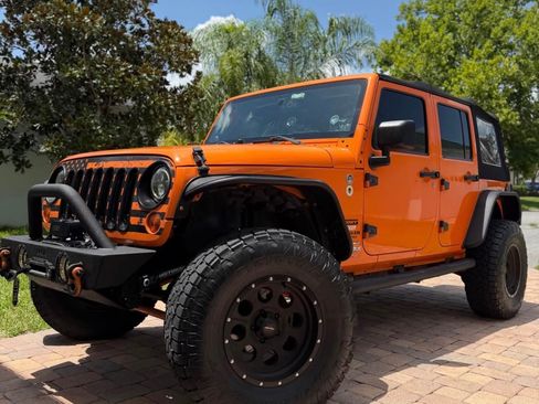 Used 2013 Jeep Wrangler Unlimited Sport AWD/4WD image 1