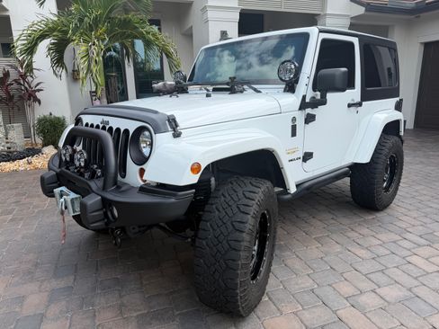 Used 2012 Jeep Wrangler Sahara AWD/4WD image 1
