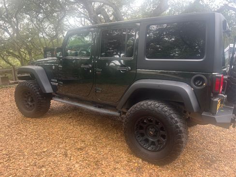 Used 2011 Jeep Wrangler Unlimited Sport image 1