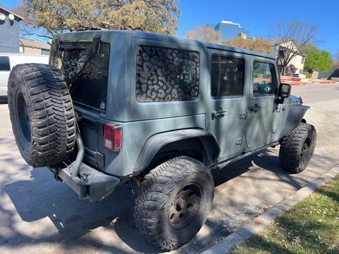 Used 2014 Jeep Wrangler Unlimited Sahara w/ Max Tow Package image 4