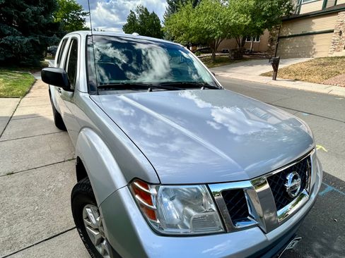 Used 2015 Nissan Frontier SV w/ SV Value Truck Package AWD/4WD image 1
