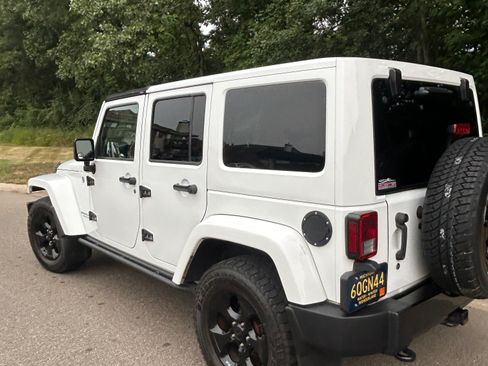 Used 2015 Jeep Wrangler Unlimited Sahara AWD/4WD image 1