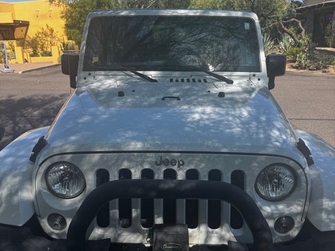 Used 2015 Jeep Wrangler Unlimited Sahara AWD/4WD image 1