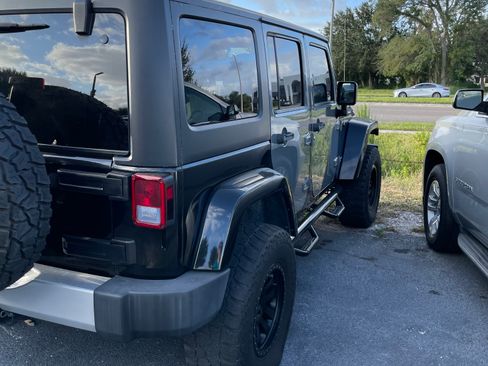 Used 2014 Jeep Wrangler Unlimited Sahara w/ Max Tow Package AWD/4WD image 10