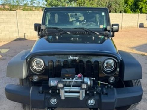 Used 2014 Jeep Wrangler Unlimited Sport image 1