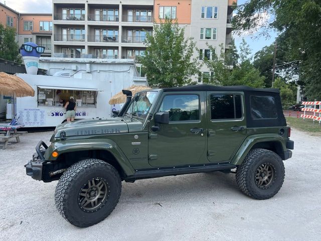 Used 2016 Jeep Wrangler Unlimited Sahara AWD/4WD image 1