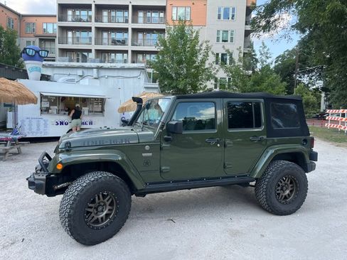 Used 2016 Jeep Wrangler Unlimited Sahara AWD/4WD image 1