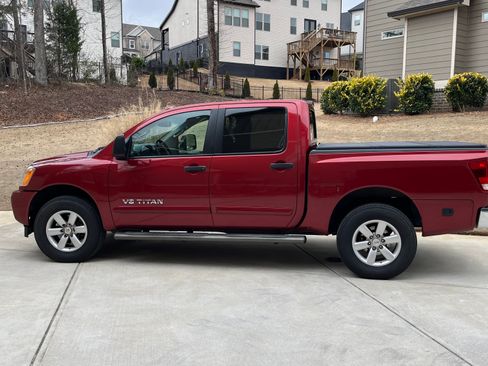 Used 2013 Nissan Titan SV w/ SV Premium Utility Pkg image 1