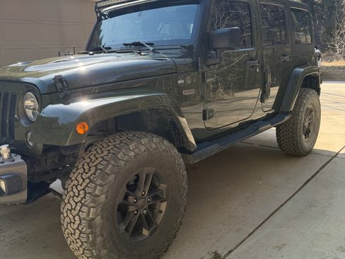 Used 2016 Jeep Wrangler Unlimited Sahara image 1