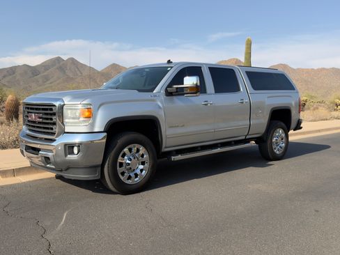 Used 2015 GMC Sierra 2500 SLT w/ Duramax Plus Package AWD/4WD image 1