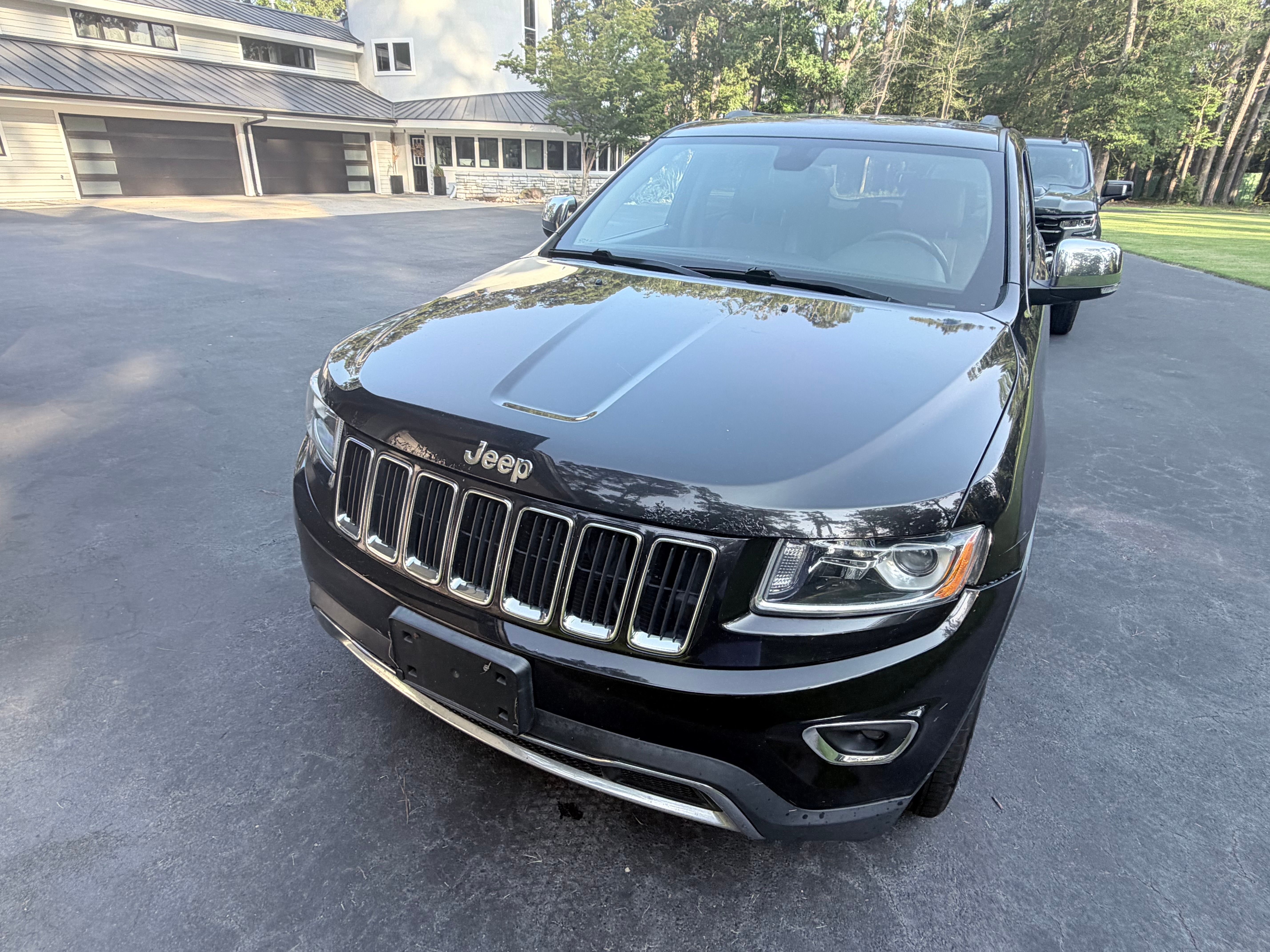 Used 2014 Jeep Grand Cherokee Limited AWD/4WD image 1