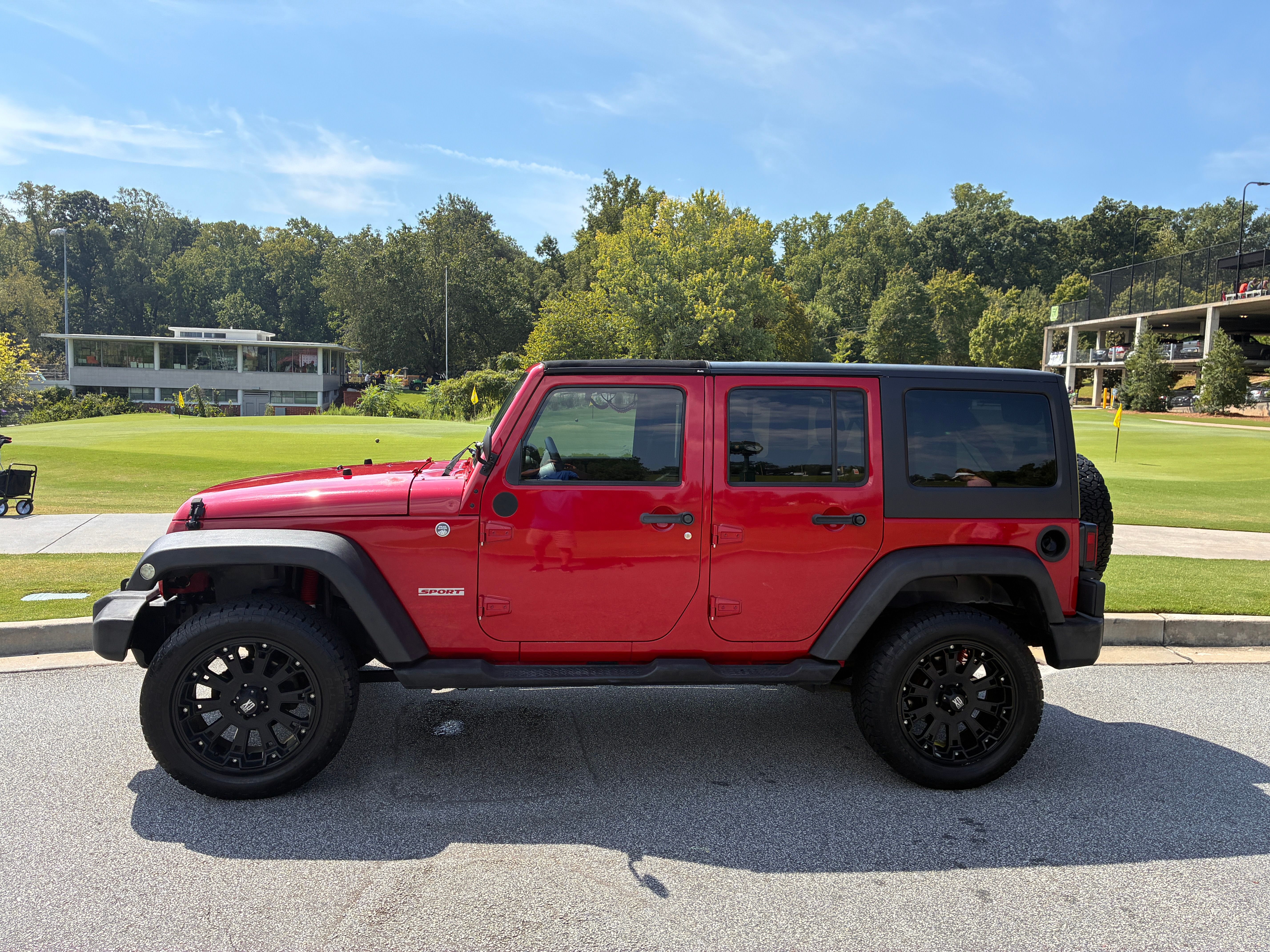 Used 2012 Jeep Wrangler Unlimited Sport AWD/4WD image 1