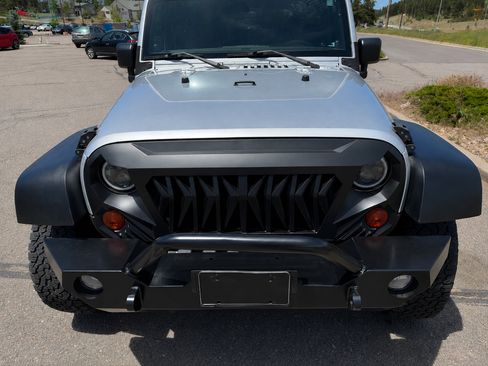 Used 2011 Jeep Wrangler Unlimited Sport AWD/4WD image 2