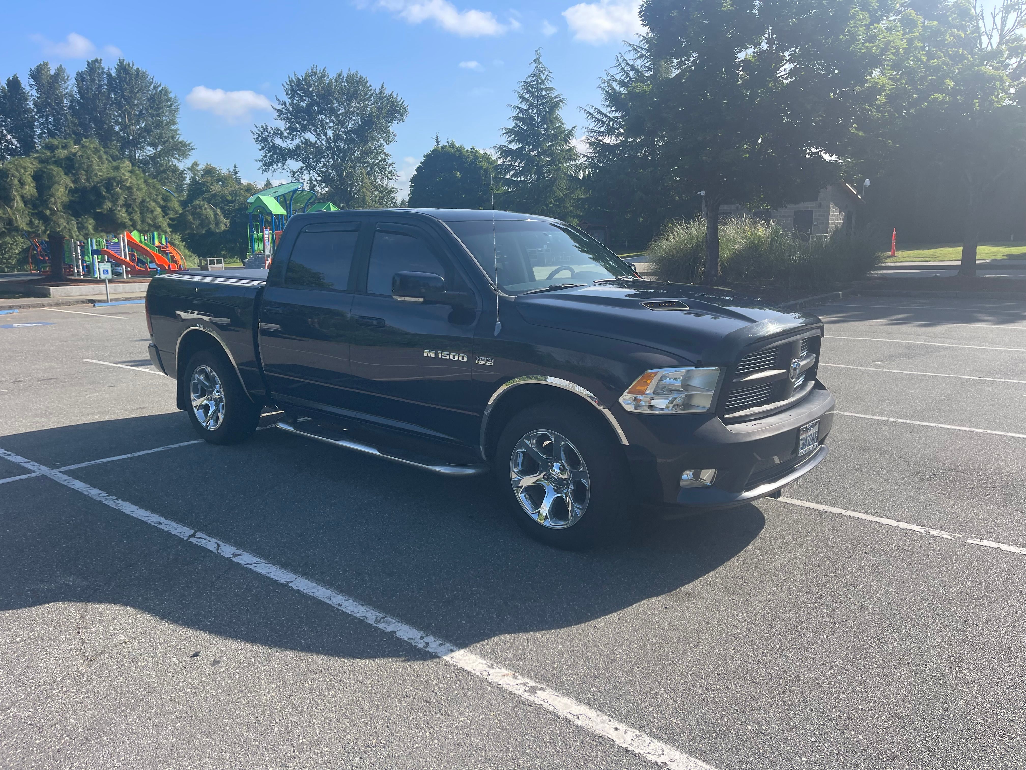 Used 2012 RAM 1500 Sport w/ Sport Premium Group AWD/4WD image 2