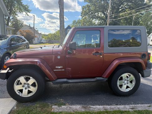 Used 2009 Jeep Wrangler Sahara w/ Dual Top Group AWD/4WD image 1