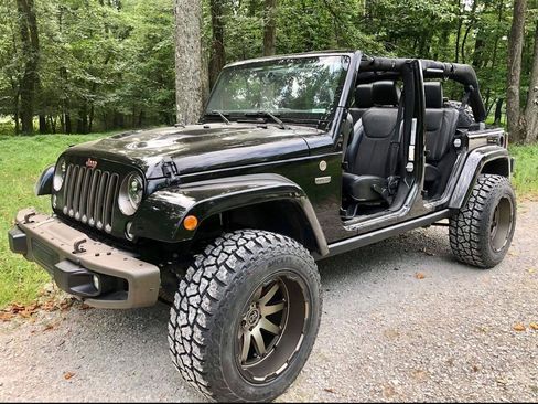 Used 2016 Jeep Wrangler Unlimited Sahara image 1