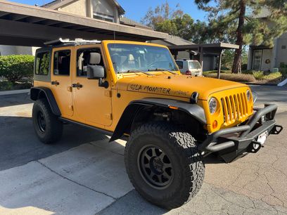 Used 2012 Jeep Wrangler Unlimited Sport w/ Black Appearance Group