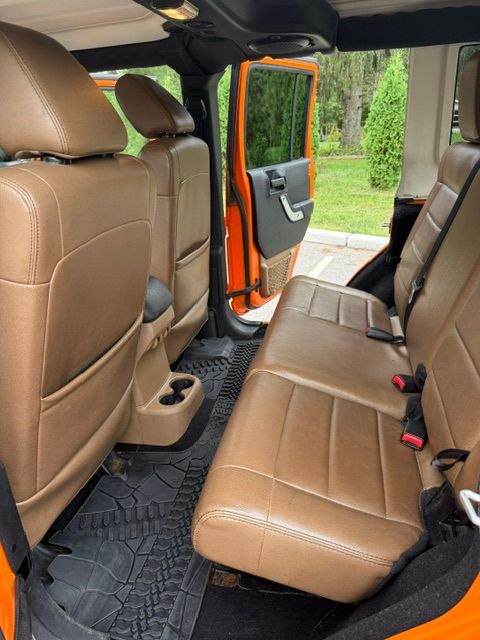 Used 2012 Jeep Wrangler Unlimited Sahara w/ Dual Top Group AWD/4WD image 10