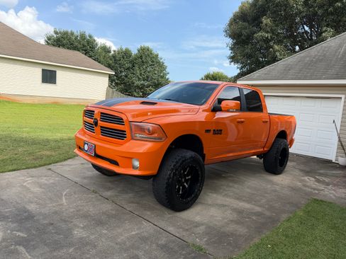 Used 2017 RAM 1500 Sport w/ Ignition Orange Sport Package AWD/4WD image 1