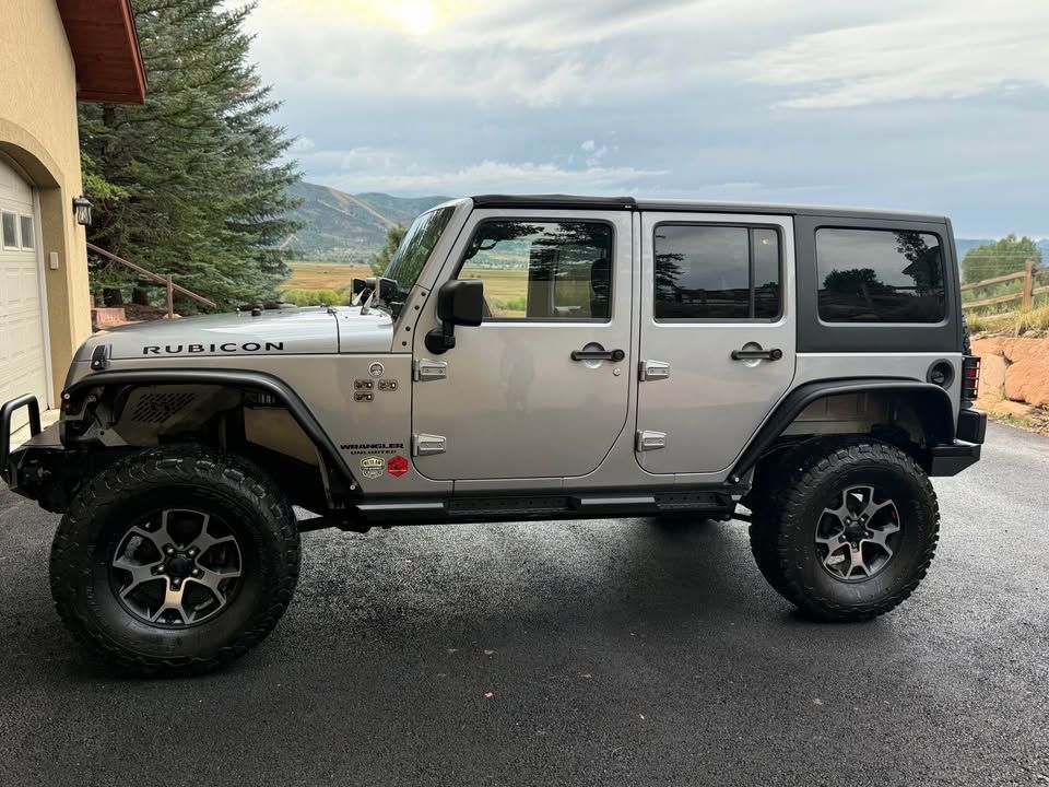 Used 2014 Jeep Wrangler Unlimited Rubicon w/ Connectivity Group AWD/4WD image 1