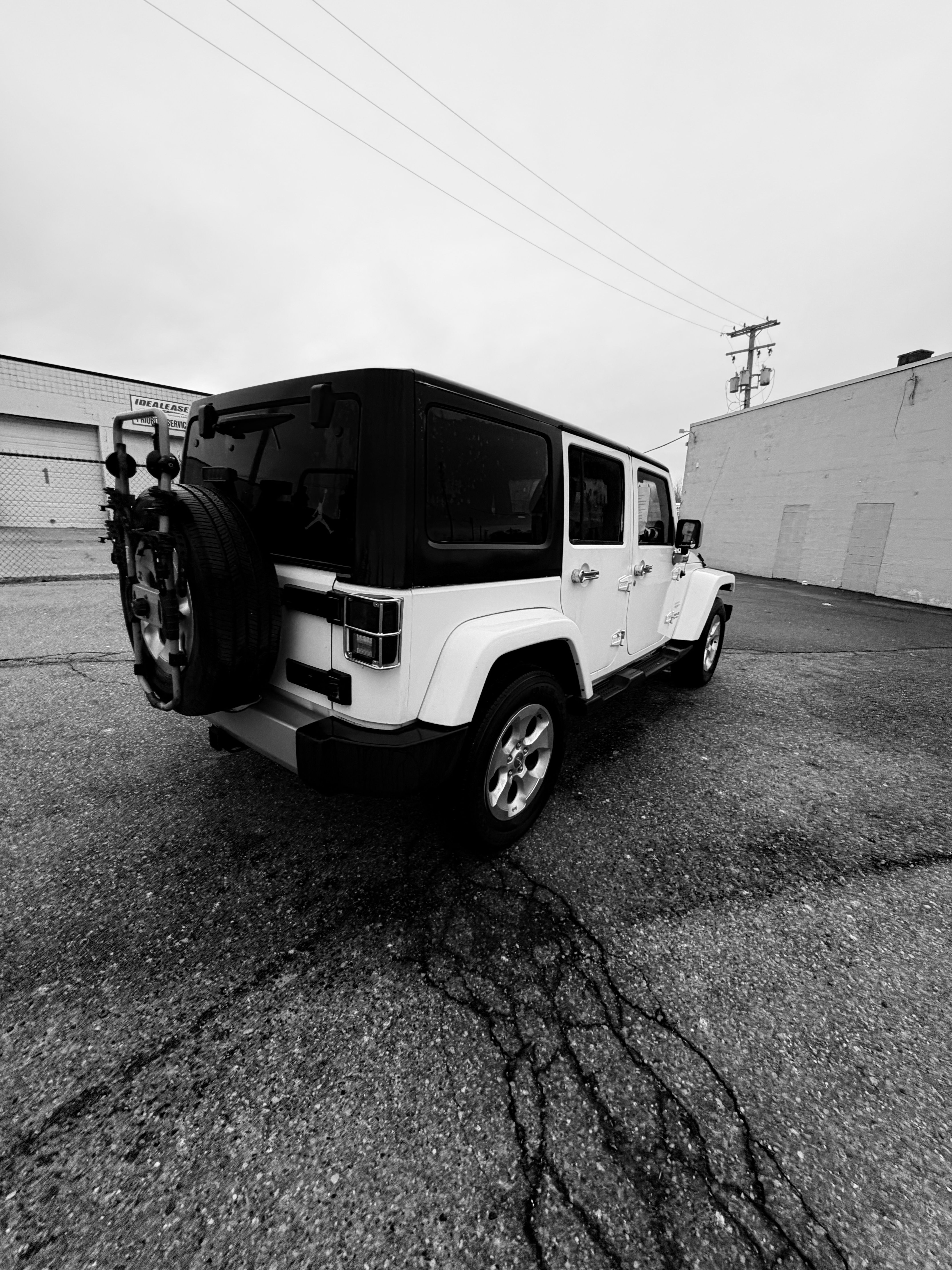 Used 2013 Jeep Wrangler Unlimited Sahara w/ Dual Top Group AWD/4WD image 2