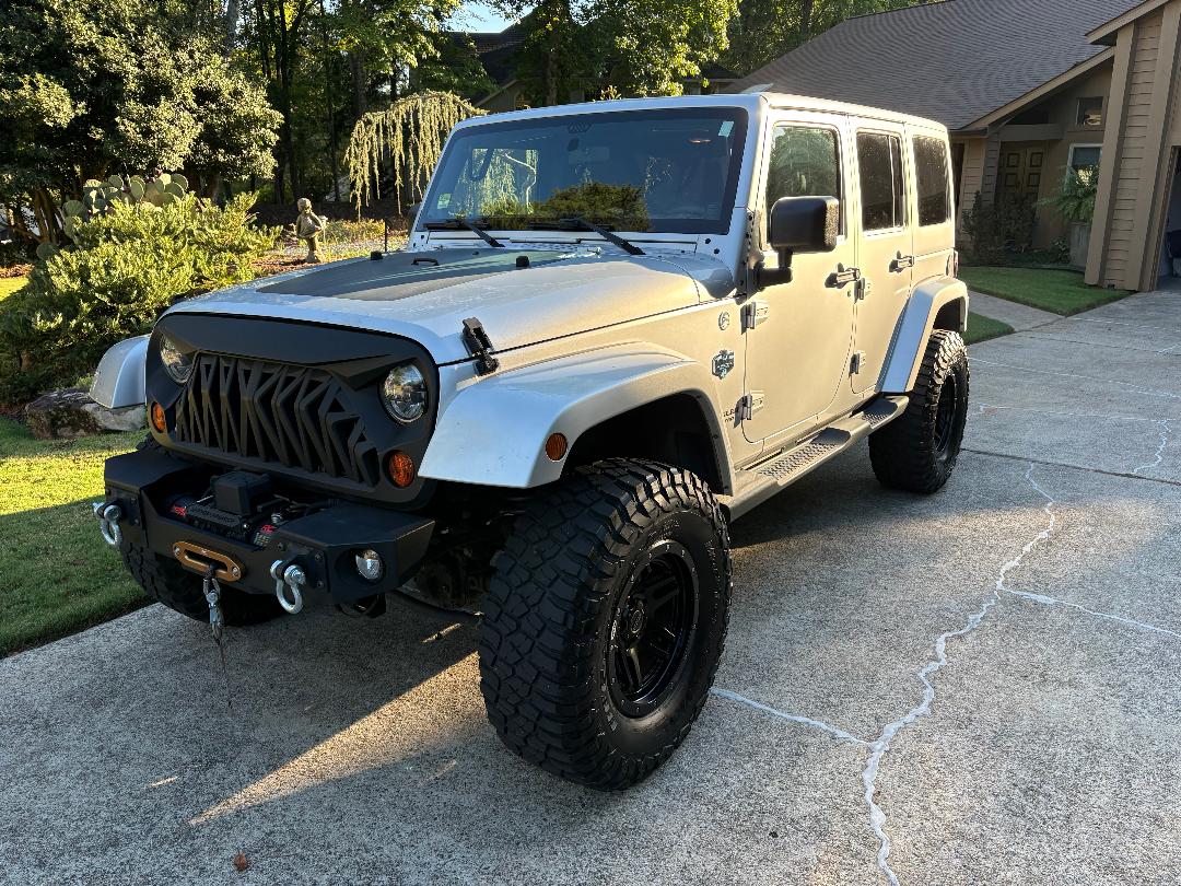 Used 2012 Jeep Wrangler Unlimited Sahara AWD/4WD image 1