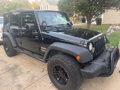Used 2016 Jeep Wrangler Unlimited Sport w/ Mopar Black Appearance Group