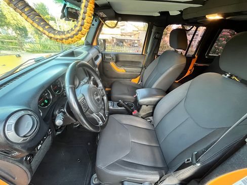Used 2012 Jeep Wrangler Unlimited Sport w/ Black Appearance Group AWD/4WD image 13