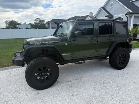 Used 2007 Jeep Wrangler Unlimited Rubicon w/ Dual Top Group AWD/4WD image 1