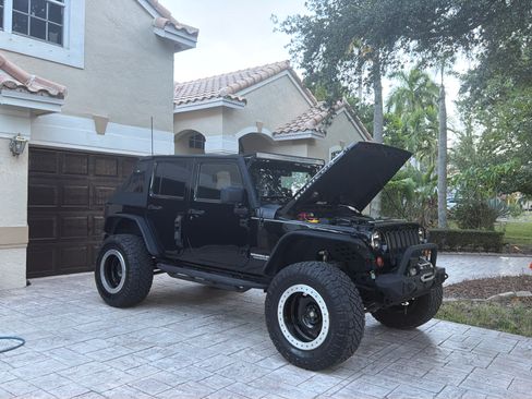 Used 2012 Jeep Wrangler Unlimited Rubicon AWD/4WD image 1