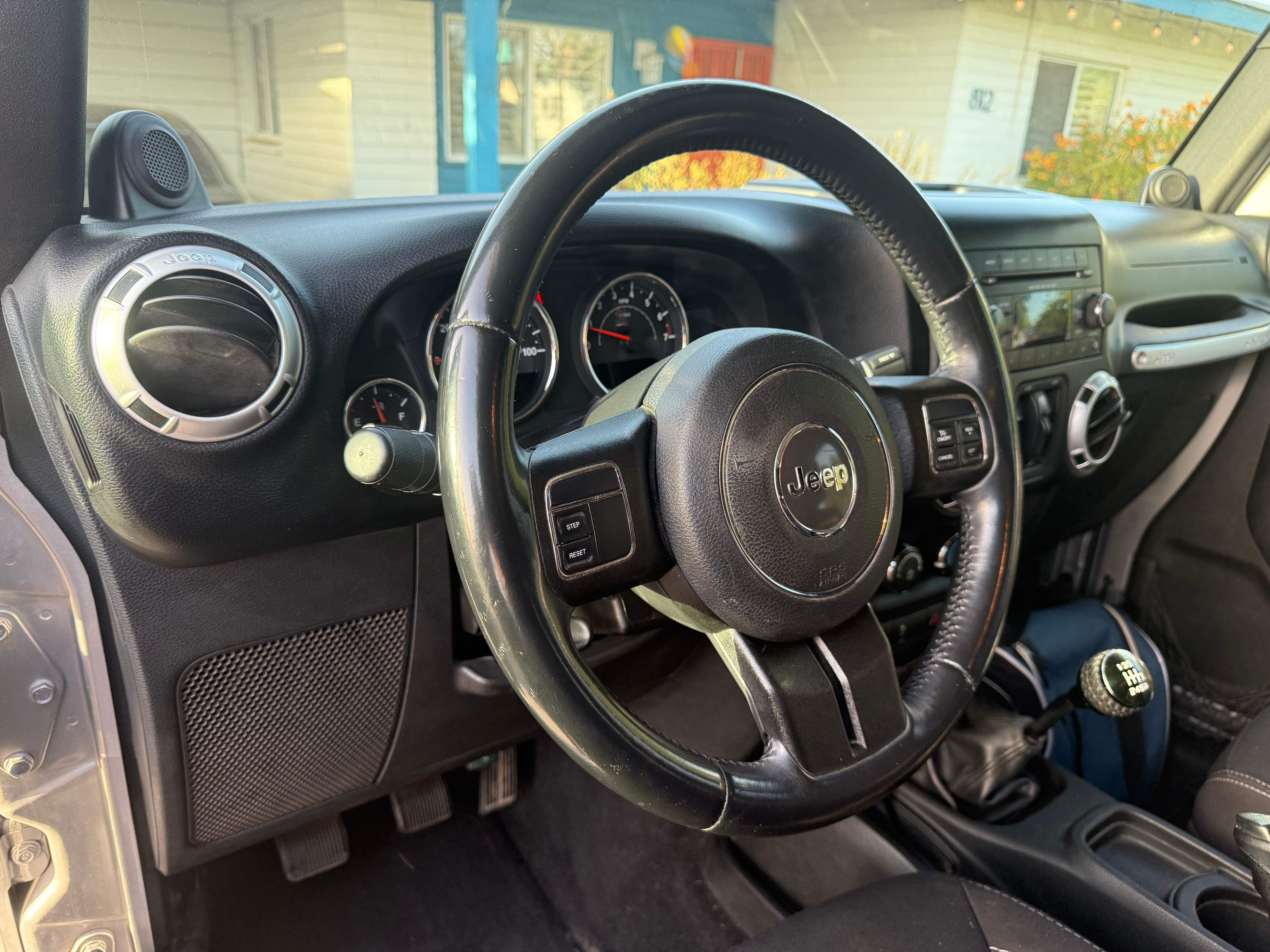 Used 2014 Jeep Wrangler Unlimited Sahara AWD/4WD image 13