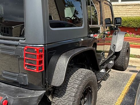Used 2014 Jeep Wrangler Unlimited Sahara w/ Mopar Chrome Edition Group AWD/4WD image 16