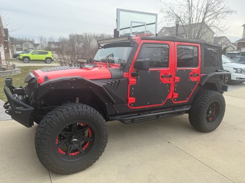 Used 2013 Jeep Wrangler Unlimited Sport AWD/4WD image 1