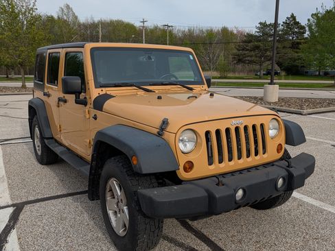 Used 2013 Jeep Wrangler Unlimited Sport AWD/4WD image 1