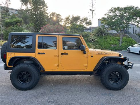 Used 2012 Jeep Wrangler Unlimited Sport w/ Black Appearance Group AWD/4WD image 8
