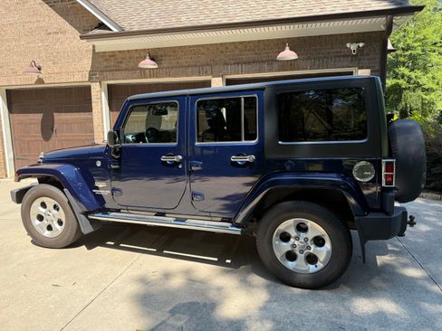 Used 2013 Jeep Wrangler Unlimited Sahara w/ Mopar Chrome Edition Group AWD/4WD image 5