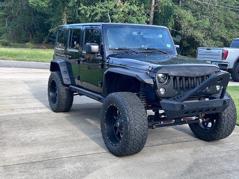 Used 2014 Jeep Wrangler Unlimited Sahara AWD/4WD image 1