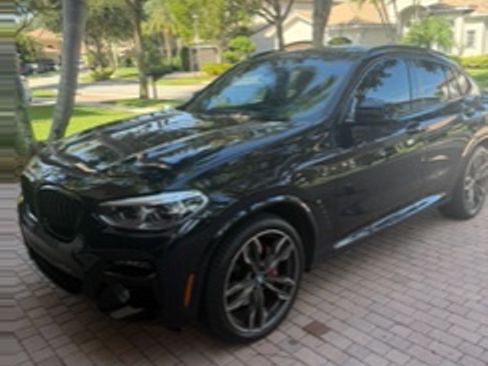 Used 2021 BMW X4 M40i w/ Executive Package AWD/4WD image 1